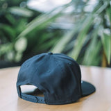 Hat - Black "N" on Navy Snap-back