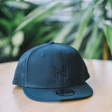 Hat - Black "N" on Navy Snap-back